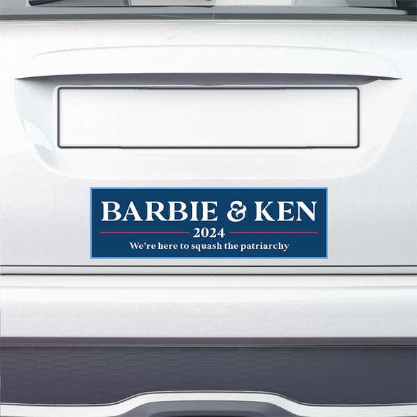 Barbie and Ken bumper sticker on the bumper of a white car