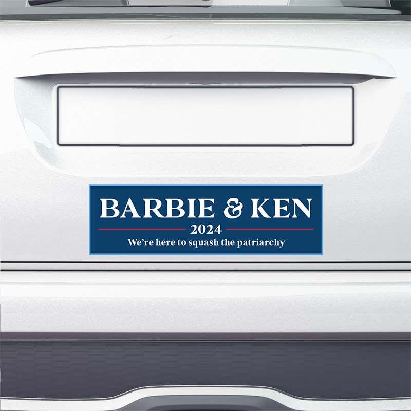 Barbie and Ken bumper sticker on the bumper of a white car