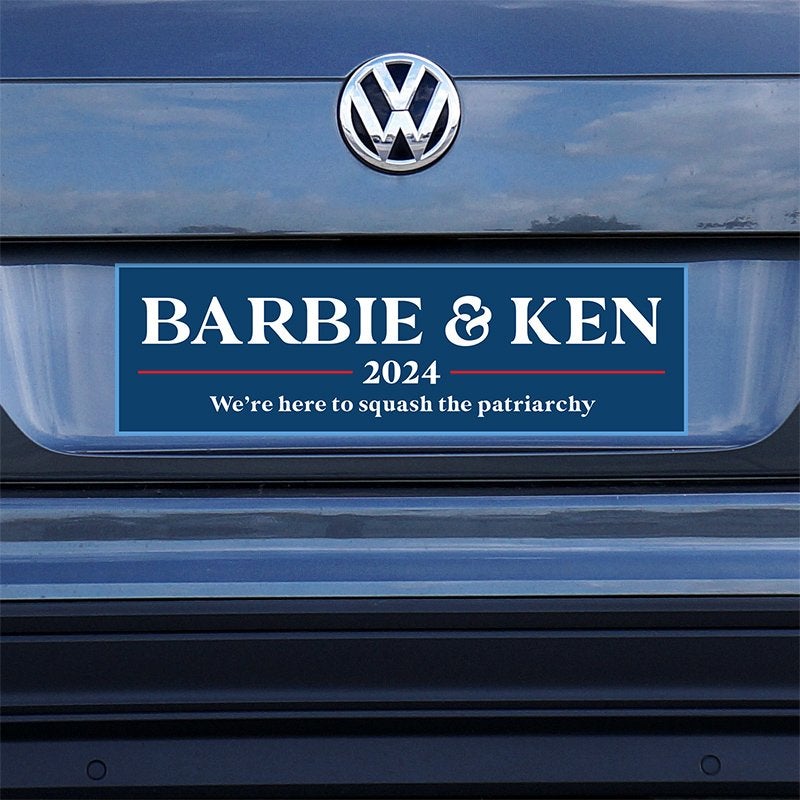 Barbie and Ken bumper sticker on a gray car