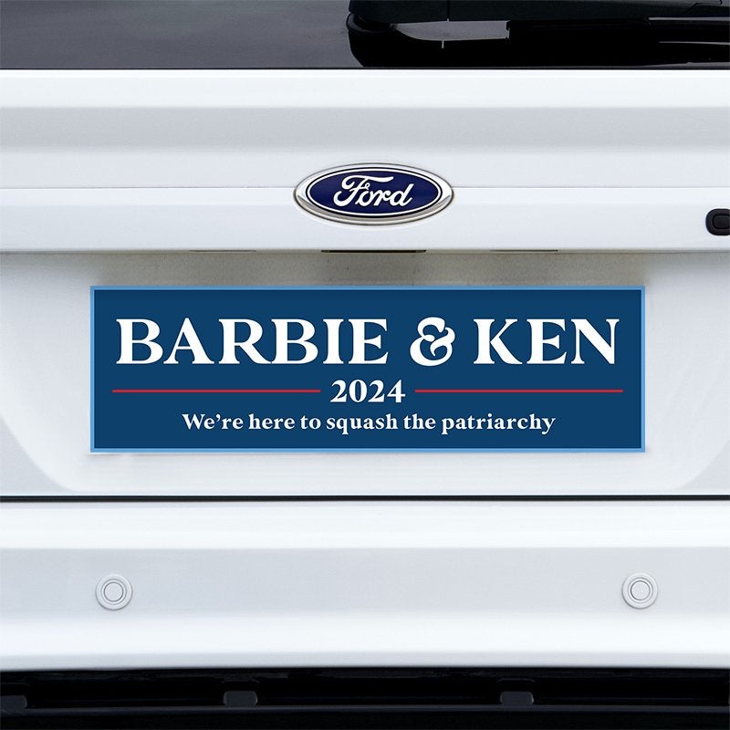 Barbie and Ken bumper sticker on a white truck