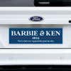 Barbie and Ken bumper sticker on a white truck