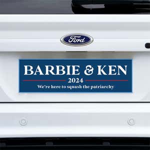 Barbie and Ken bumper sticker on a white truck