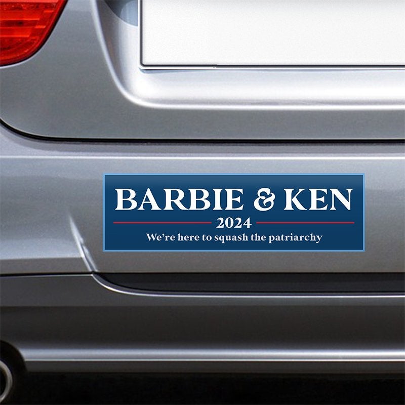 Barbie and Ken bumper sticker on the bumper of a gray car
