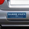 Barbie and Ken bumper sticker on the bumper of a gray car
