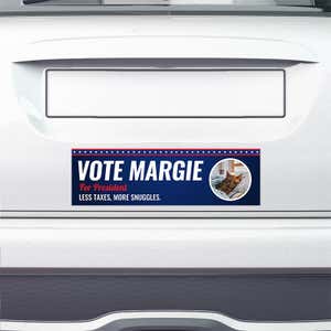 Custom Round Photo Political Bumper Sticker on the bumper of a white car