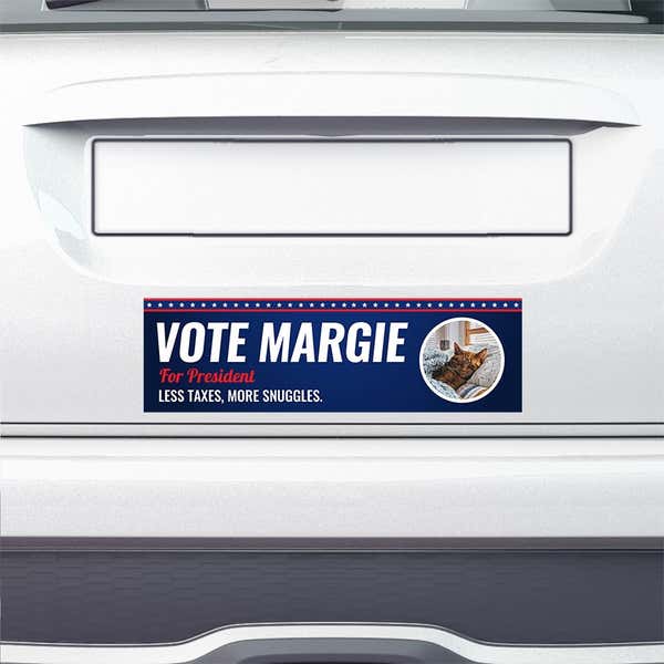 Custom Round Photo Political Bumper Sticker on the bumper of a white car