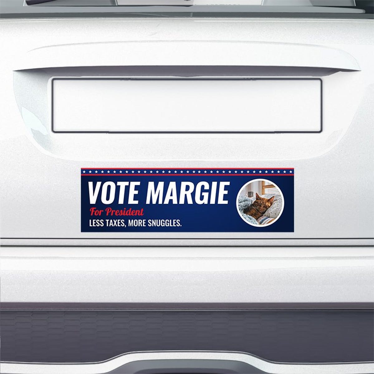Custom Round Photo Political Bumper Sticker on the bumper of a white car