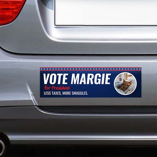 Custom Round Photo Political Bumper Sticker on the bumper of a gray car