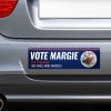 Custom Round Photo Political Bumper Sticker on the bumper of a gray car