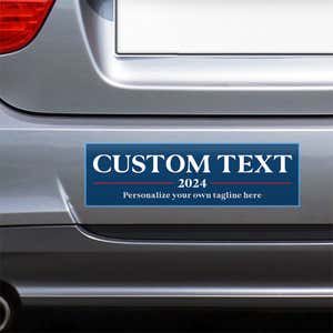 Custom Text Political Bumper Sticker on the bumper of a gray car