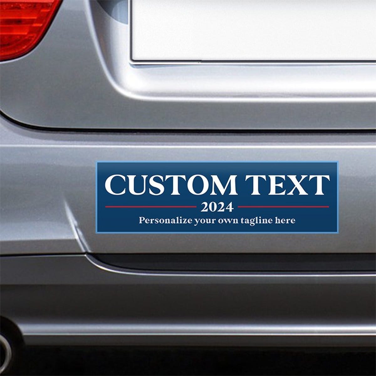 Custom Text Political Bumper Sticker on the bumper of a gray car