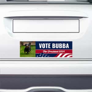 Custom Photo Political Bumper Sticker on the bumper of a white car