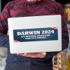 Darwin Political Bumper Sticker on a laptop