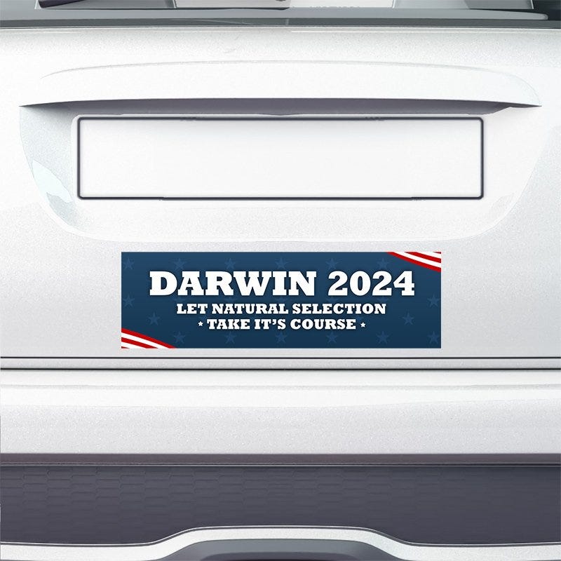 Darwin Political Bumper Sticker on the bumper of a white car