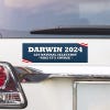 Darwin Political Bumper Sticker above a white car's tail light