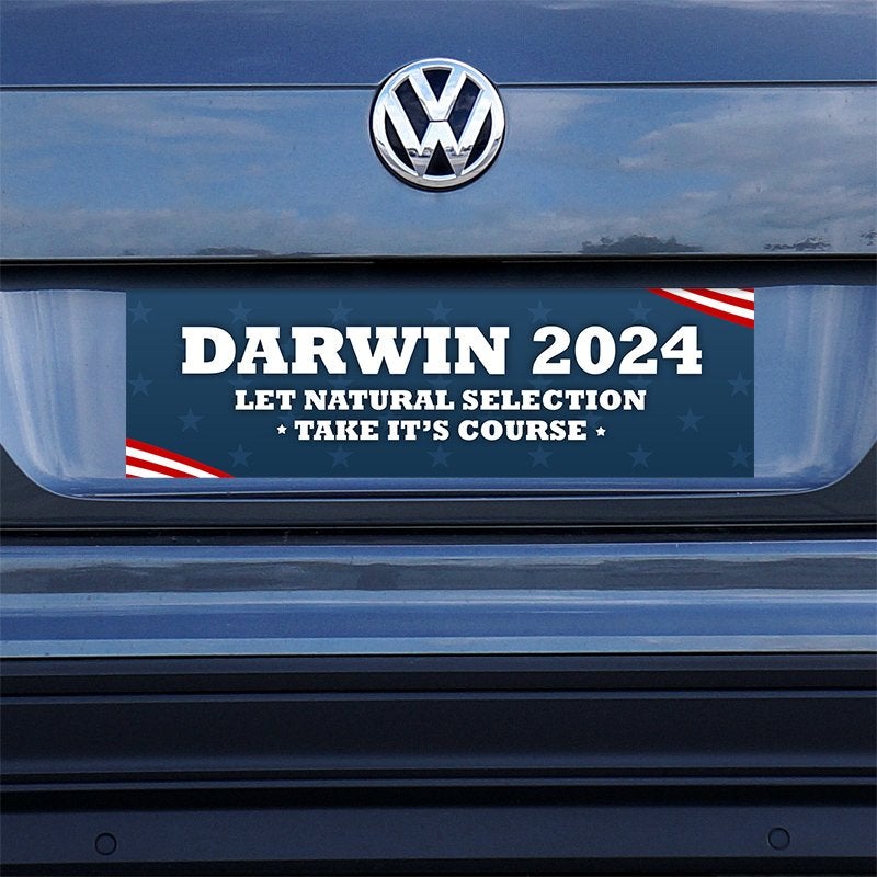 Darwin Political Bumper Sticker on a gray car