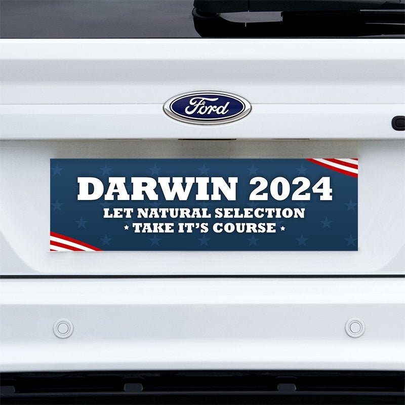 Darwin Political Bumper Sticker on a white truck