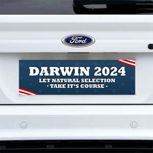 Darwin Political Bumper Sticker on a white truck