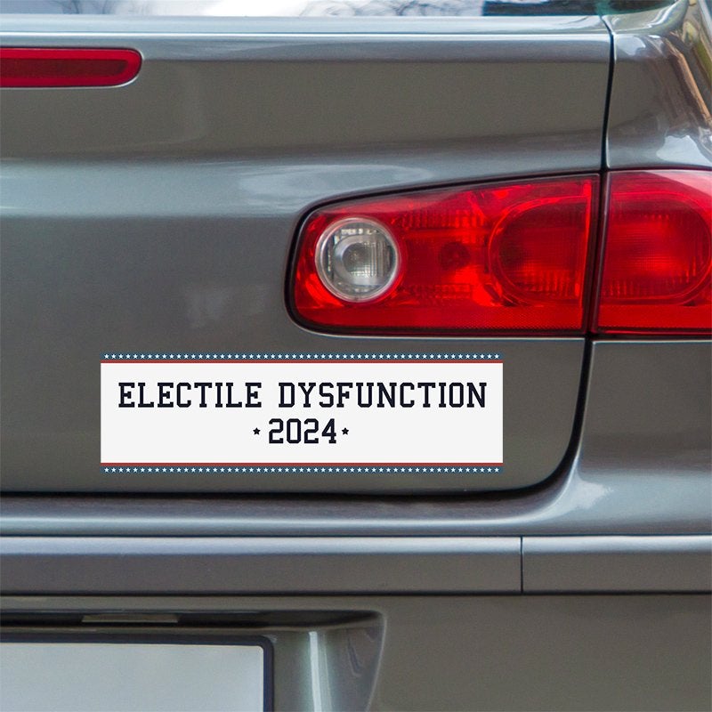 Electile Dysfunction Political Bumper Sticker below a gray car's tail light