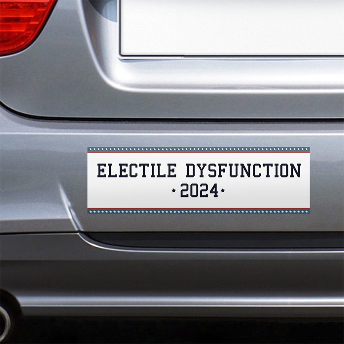 Electile Dysfunction Political Bumper Sticker on the bumper of a gray car