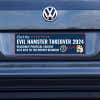 Evil Hamster Political Bumper Sticker on a gray car