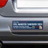 Evil Hamster Political Bumper Sticker on the bumper of a gray car