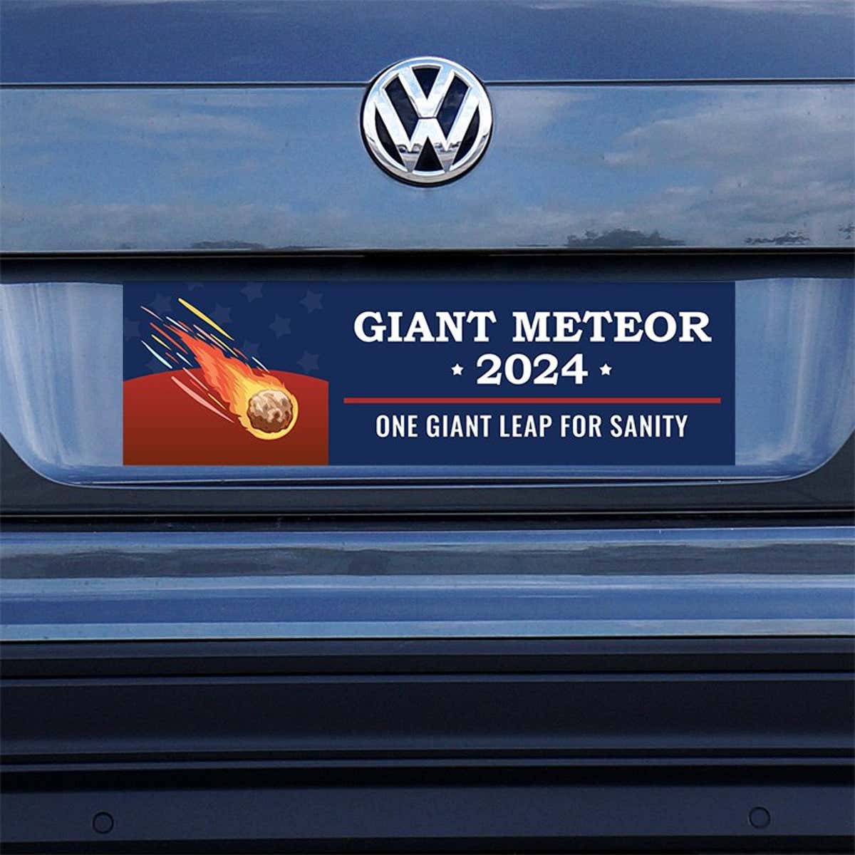 Giant Meteor Bumper Sticker on a gray car
