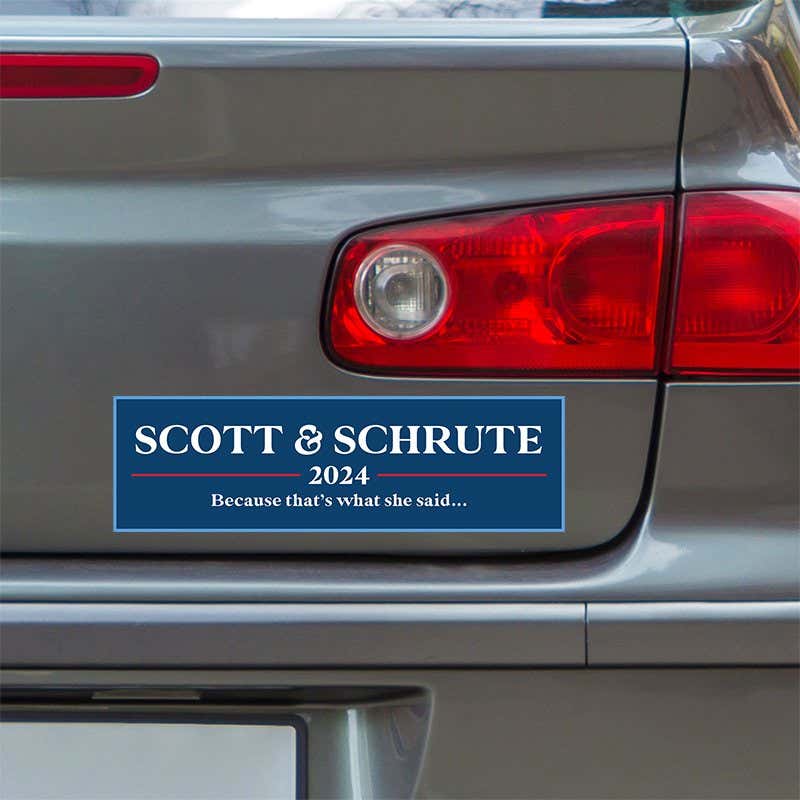 Scott Schrute Political Bumper Sticker below a gray car's tail light