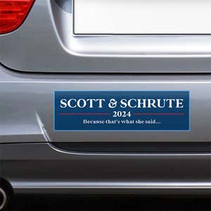 Scott Schrute Political Bumper Sticker on the bumper of a gray car