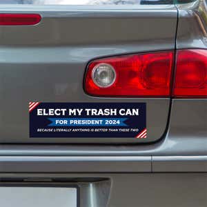 Elect My Trash Can Bumper Sticker below a gray car's tail light