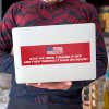 American Flag Funny Political Bumper Sticker on a laptop