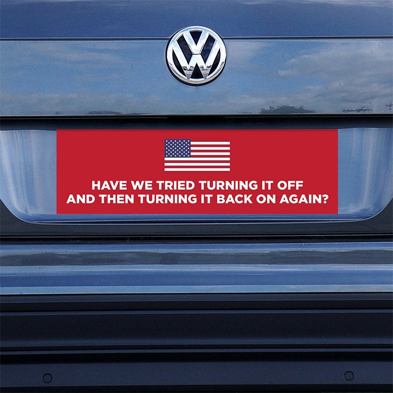 American Flag Funny Political Bumper Sticker on a gray car
