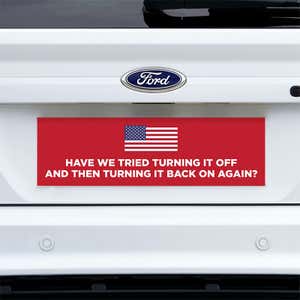 American Flag Funny Political Bumper Sticker on a white truck