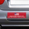 American Flag Funny Political Bumper Sticker on the bumper of a gray car