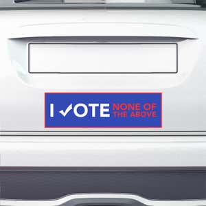 None of the Above Political Bumper Sticker on the bumper of a white car