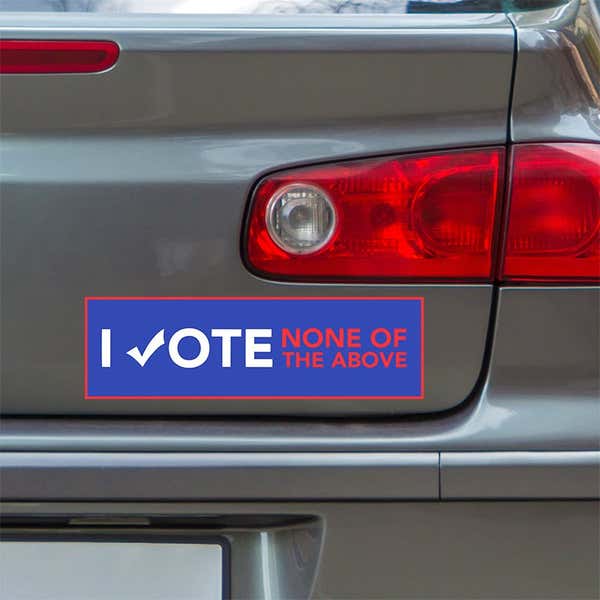 None of the Above Political Bumper Sticker below a gray car's tail light