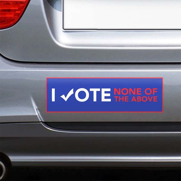 None of the Above Political Bumper Sticker on the bumper of a gray car