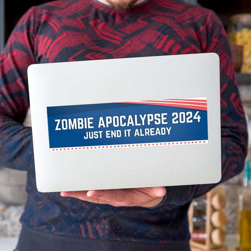 Zombie Apocalypse Political Bumper Sticker on a laptop