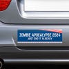Zombie Apocalypse Political Bumper Sticker on the bumper of a gray car