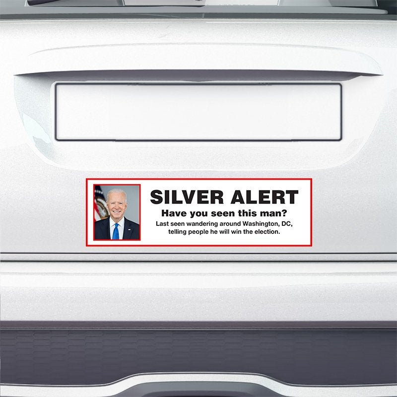 Silver Alert Political Bumper Sticker on the bumper of a white car