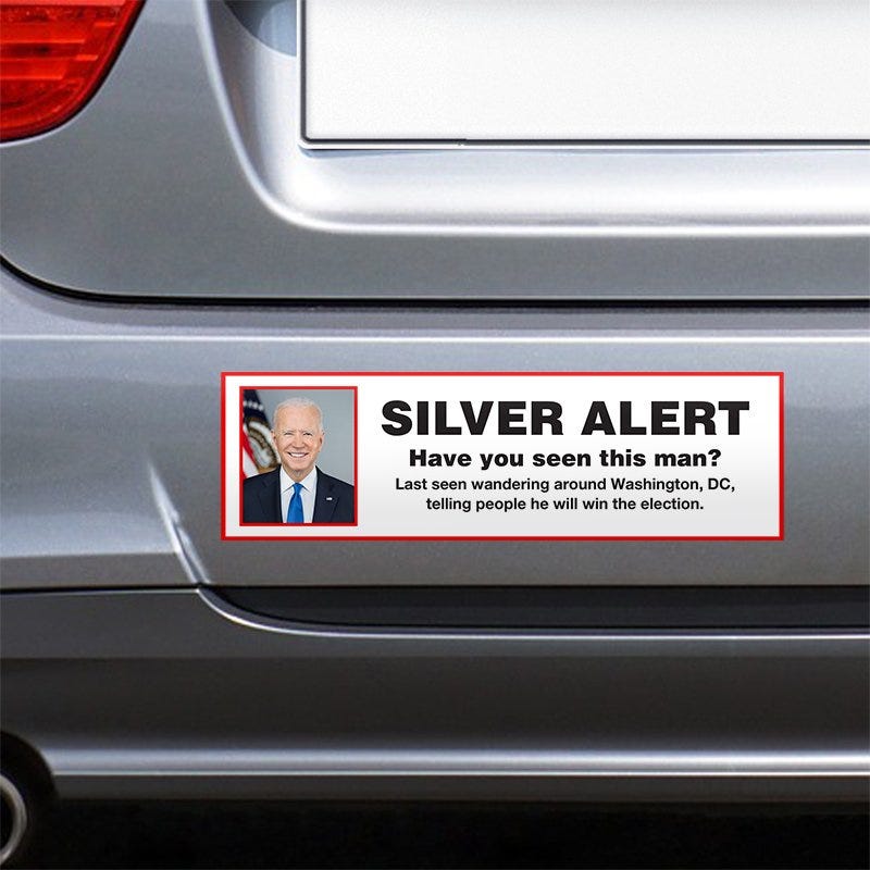 Silver Alert Political Bumper Sticker on the bumper of a gray car