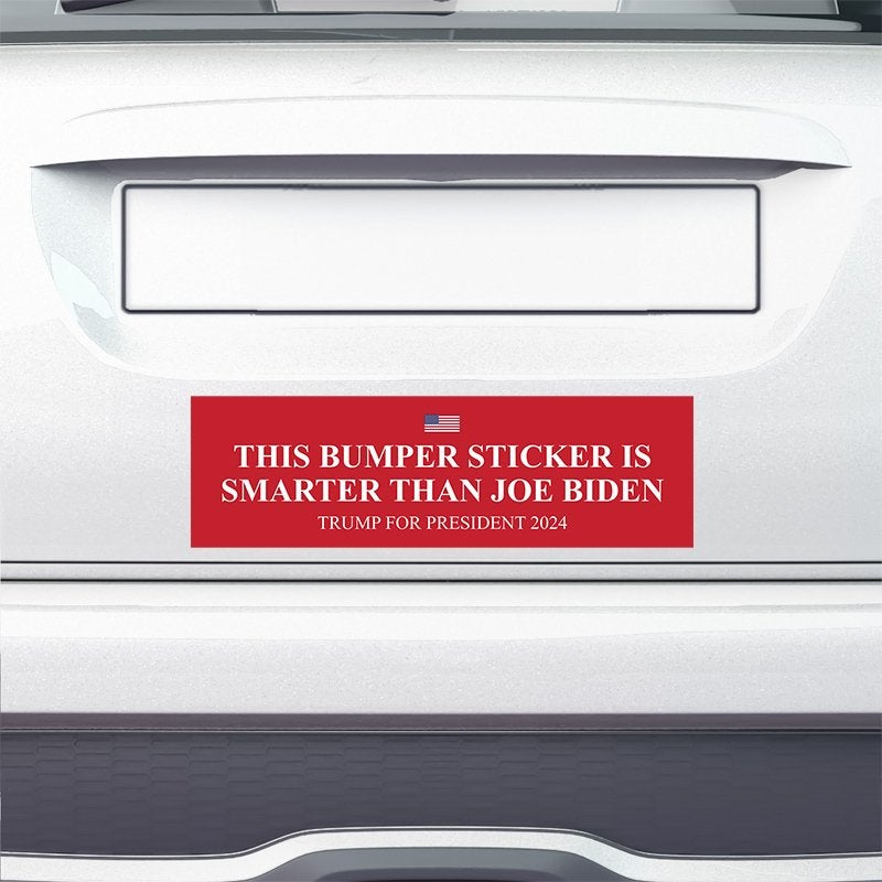 Smarter Than Biden Bumper Sticker on the bumper of a white car