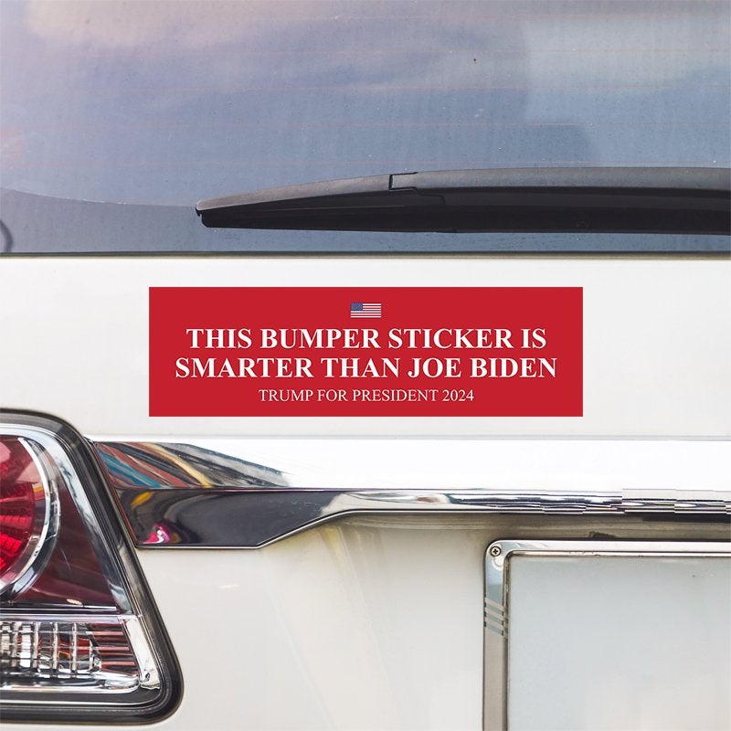 Smarter Than Biden Bumper Sticker above a white car's tail light
