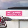 Taylor Swift for President Bumper Sticker above a white car's tail light
