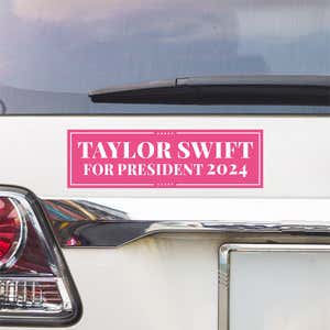 Taylor Swift for President Bumper Sticker above a white car's tail light