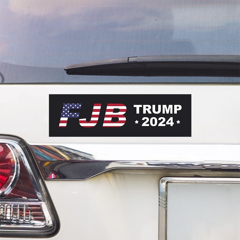 FJB Bumper Sticker above a white car's tail light