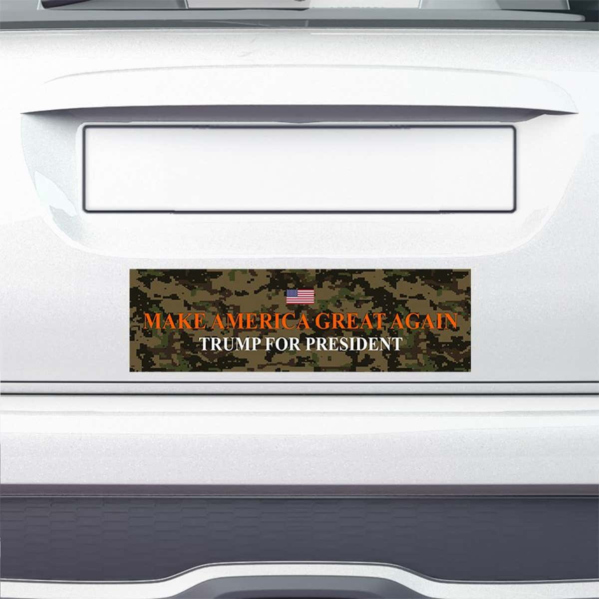 Camo MAGA Bumper Sticker on the bumper of a white car