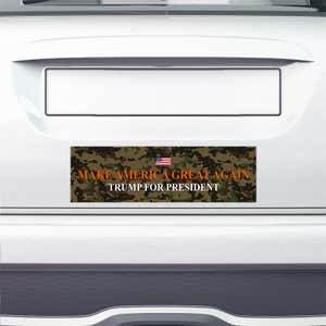 Camo MAGA Bumper Sticker on the bumper of a white car