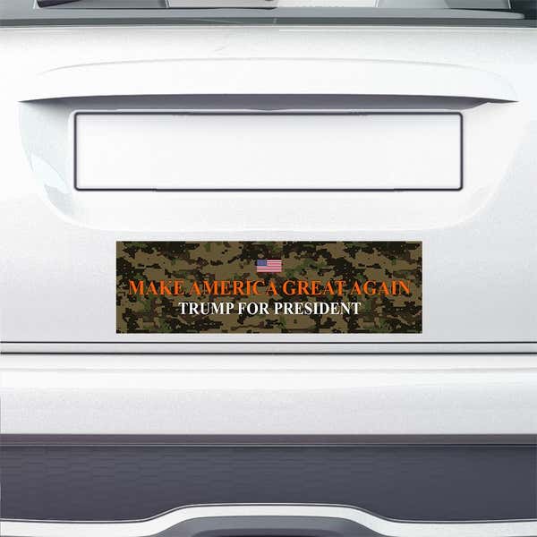 Camo MAGA Bumper Sticker on the bumper of a white car