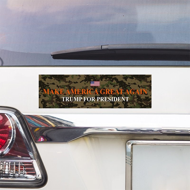 Camo MAGA Bumper Sticker above a white car's tail light
